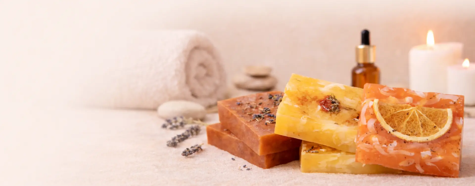 Natural handmade soaps with orange slice, lavender and herbs, eco friendly skincare by Karina Naturals