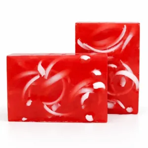 Two cherry soap bars arranged with visible swirl pattern