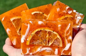 Sweet orange handmade soap with dried orange slice and poppy seeds