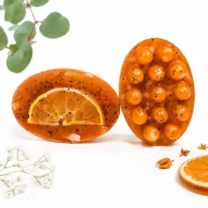 Handmade sweet orange massage soap with massage nodules and poppy seeds for exfoliation and relaxation