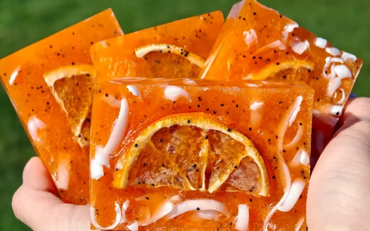 Sweet orange handmade soap with dried orange slice and poppy seeds